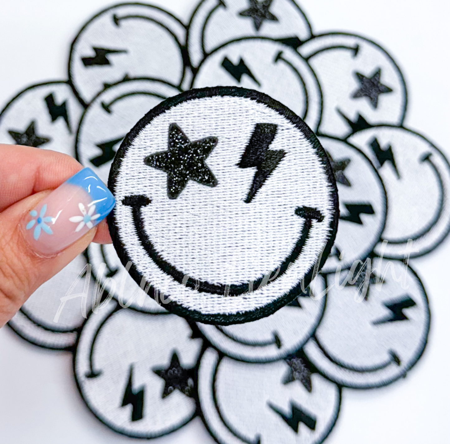 Black glitter smiley patch