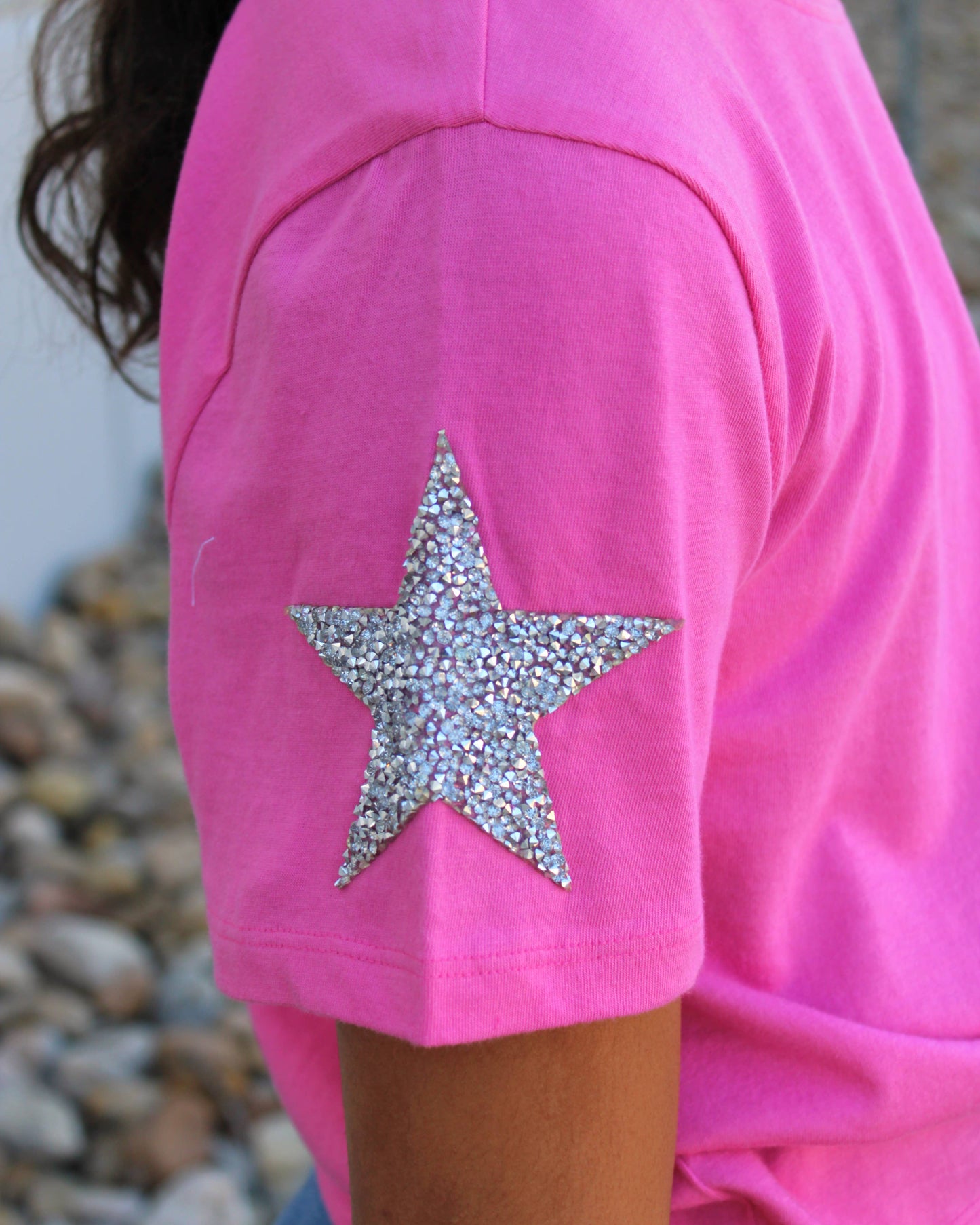 Tee with rhinestone star appliqués on Sleeves